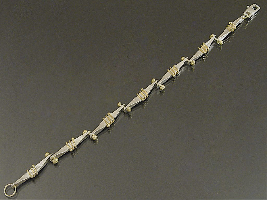 Twirly Bone Bracelet by Sana Doumet